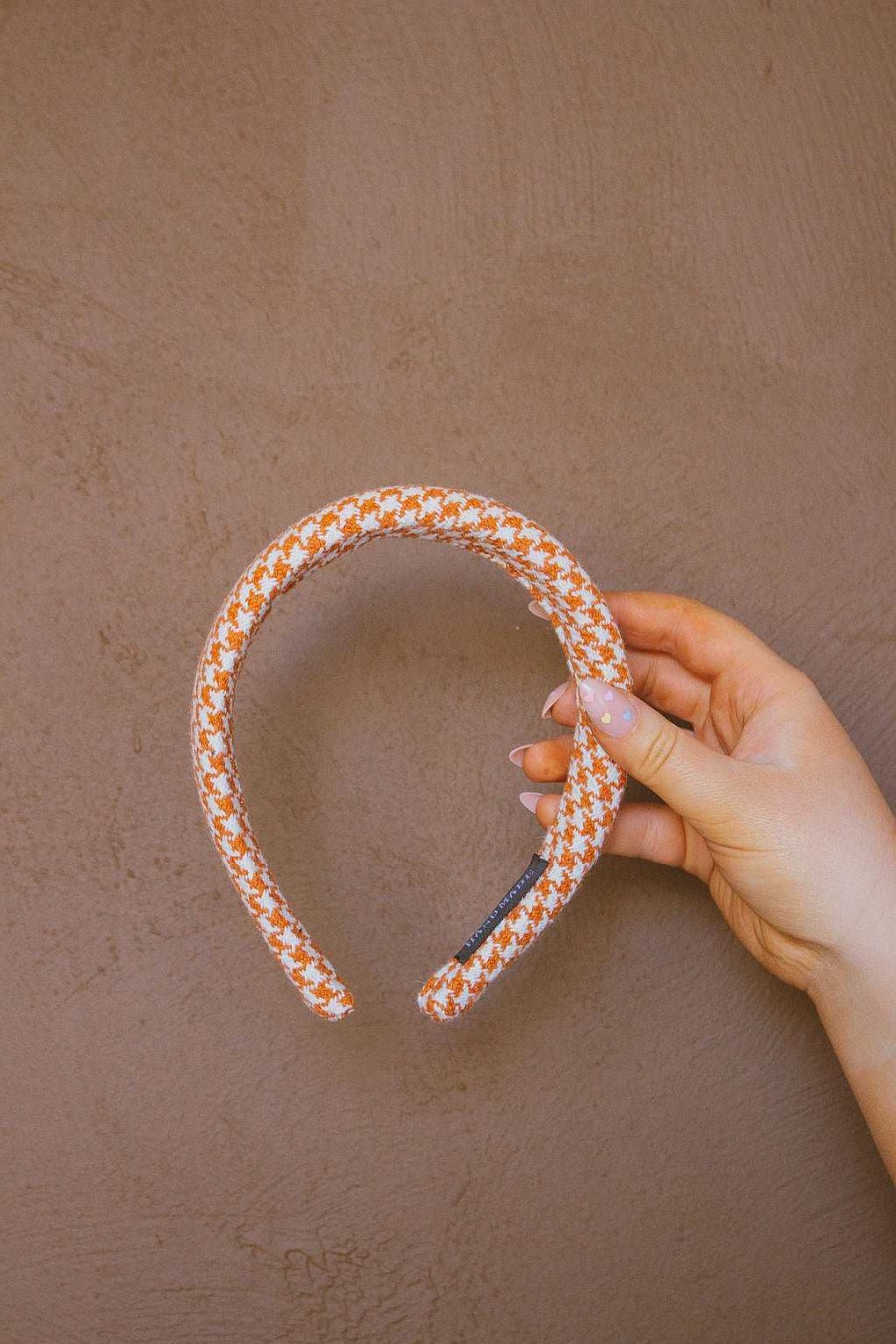 All Hair ANDI | Orange Houndstooth Hard Headband